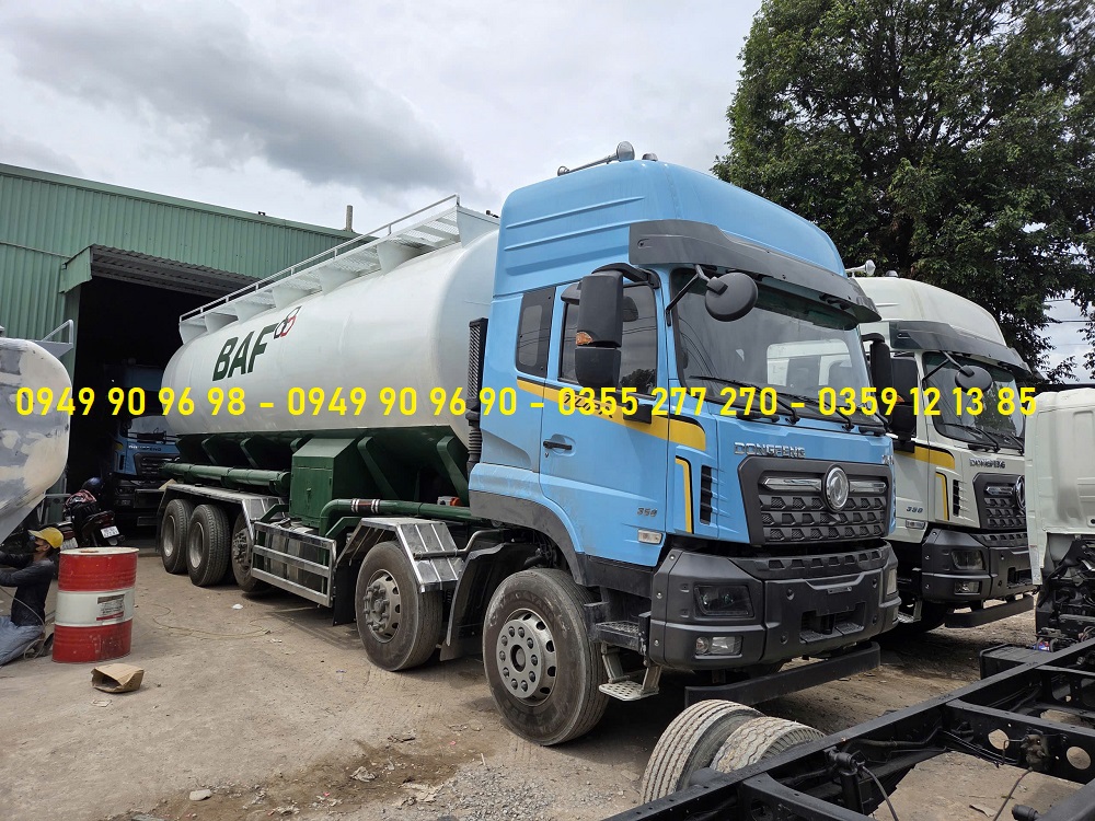 xe bồn chở cám, xe bồn chở cám thức ăn chăn nuôi, xe chở cám, xe bồn cám, xe bồn chở thức ăn chăn nuôi, xe bồn chở cám dạng thổi, xe bồn chở cám khí nén, xe bồn chở cám trục vít, xe chở cám dạng thổi, xe vận chuyển thức ăn chăn nuôi, cấu tạo xe bồn chở cám, nguyên lý hoạt động xe bồn chở cám, hệ thống khí nén xe bồn chở cám, máy nén khí xe bồn chở cám, PTO xe bồn chở cám, bồn chở cám thức ăn chăn nuôi, bồn chở cám dạng thổi, bồn cám khí nén, xe bồn chở cám inox, xe bồn chở cám thép, xe bồn chở cám nhôm, đóng xe bồn chở cám, cải tạo xe bồn chở cám, sản xuất xe bồn chở cám, thiết kế xe bồn chở cám, báo giá xe bồn chở cám, giá xe bồn chở cám, xe bồn HOWO chở cám, xe HOWO MAX chở cám, xe bồn Chenglong chở cám, xe Chenglong H5 chở cám, xe Chenglong H7 chở cám, xe bồn JAC chở cám, xe JAC N900 chở cám, xe bồn UD chở cám, xe UD Quester chở cám, xe bồn Isuzu chở cám, xe Isuzu chở cám dạng thổi, xe bồn Hino chở cám, xe Hino chở cám, sơ mi rơ moóc bồn chở cám, sơ mi rơ moóc chở cám dạng thổi, bồn chở cám công suất lớn, xe bồn vận chuyển cám viên, xe bồn vận chuyển cám bột, đơn vị đóng xe bồn chở cám uy tín, xe bồn chở cám Nguyên Vĩ Auto, nhà máy đóng xe bồn chở cám, xe bồn chở cám chất lượng cao, xe bồn chở cám giá tốt
